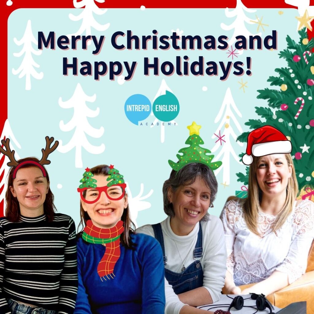Intrepid English Teachers (from left to right) Kate B,Kate R, Natalia and Lorraine. They are dressed in cartoon festive headwear such as santa hats, reindeer ears, and silly Christmas tree hairbands and glasses.